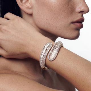 gold ring and bracelet featuring rock crystal and diamonds worn