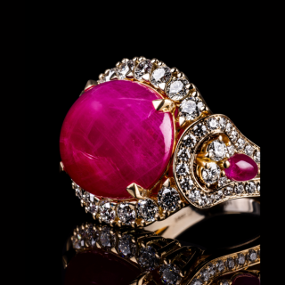 Rubinia, Burmese caboschon ruby and diamond ring
