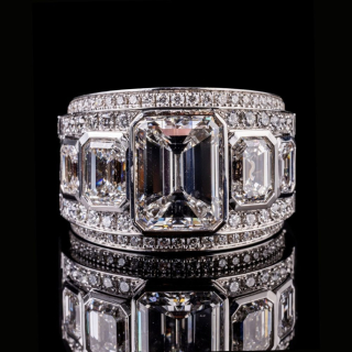 Montecarlo 18 kt white gold ring with central emerald-cut diamond and brilliant and emerald-cut diamond halo