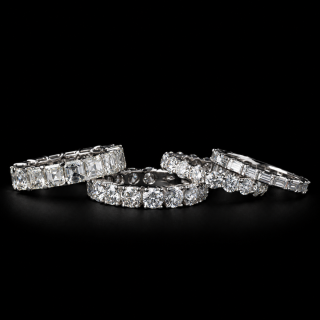 Eternity wedding rings with diamonds in various cuts