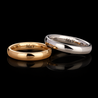 Yellow and white gold wedding rings with engraving