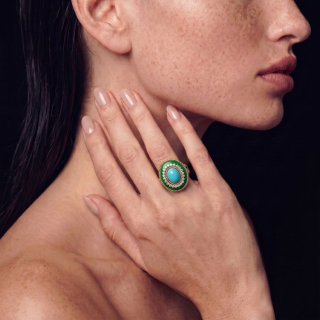 gold ring and necklace with jade, turquoise and diamonds worn