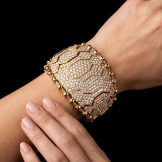 Yellow gold bracelet with pavé diamonds worn