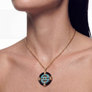 Gold Necklace with black and turquoise enemal and diamonds worn