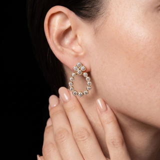 Arena, Gold and diamond earrings