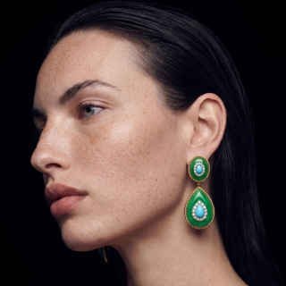 Earrings with turquoise, imperial jade, and diamonds, worn as part of a set with a necklace and ring