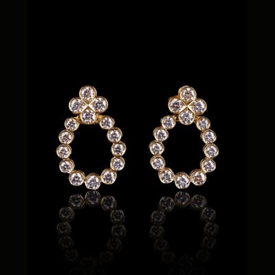 Arena, Gold and diamond earrings