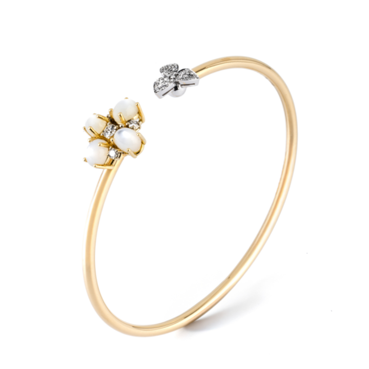 gold bracelet featuring mother-of-pearl and brilliant cut diamonds