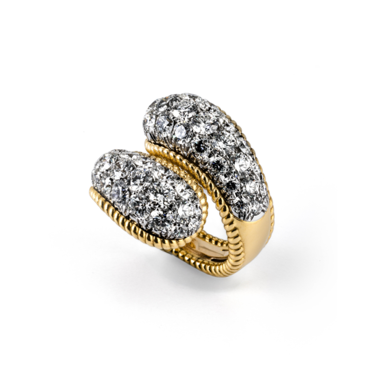 yellow gold ring featuring brilliant cut diamonds