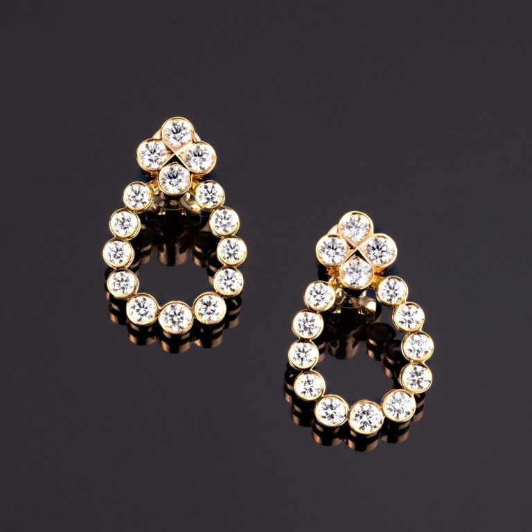 Arena, Gold and diamond earrings